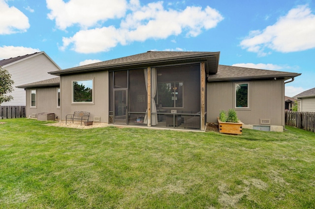 926 E Downshire Dr, Nixa, MO 65714 - rear view of house featuring a fenced backyard, roof with shingles, and a sunroom