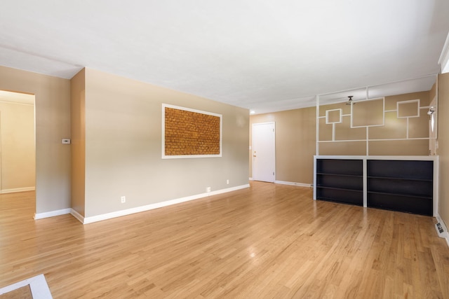 1722 S Link Ave, Springfield, MO 65804 - unfurnished living room featuring light wood-type flooring