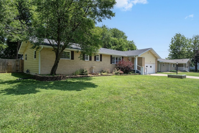 1722 S Link Ave, Springfield, MO 65804 - ranch-style home with an attached garage, brick siding, and concrete driveway