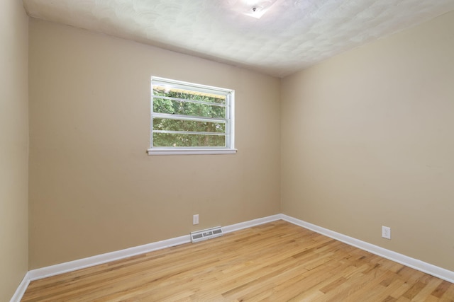 1722 S Link Ave, Springfield, MO 65804 - unfurnished room with light wood-style floors and baseboards