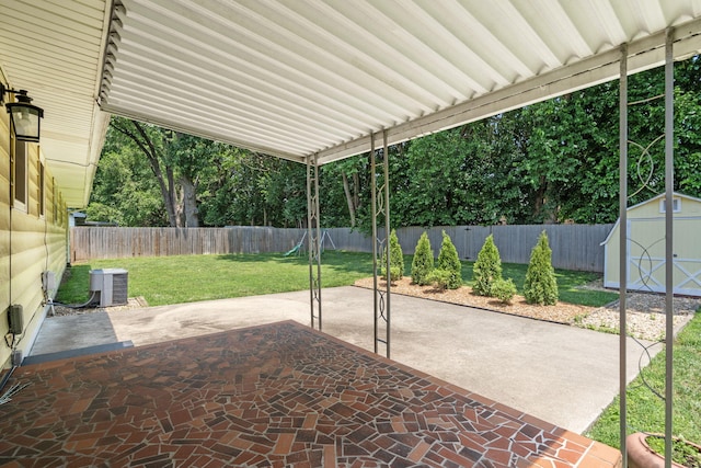 1722 S Link Ave, Springfield, MO 65804 - fenced backyard featuring a patio and a storage shed