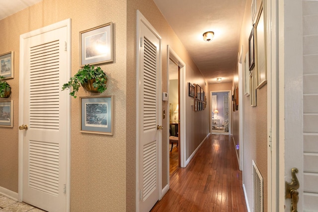 610 W Summit St, Bolivar, MO 65613 - corridor featuring hardwood / wood-style flooring and baseboards
