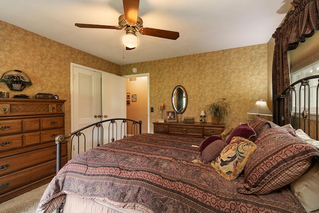 610 W Summit St, Bolivar, MO 65613 - carpeted bedroom with a ceiling fan
