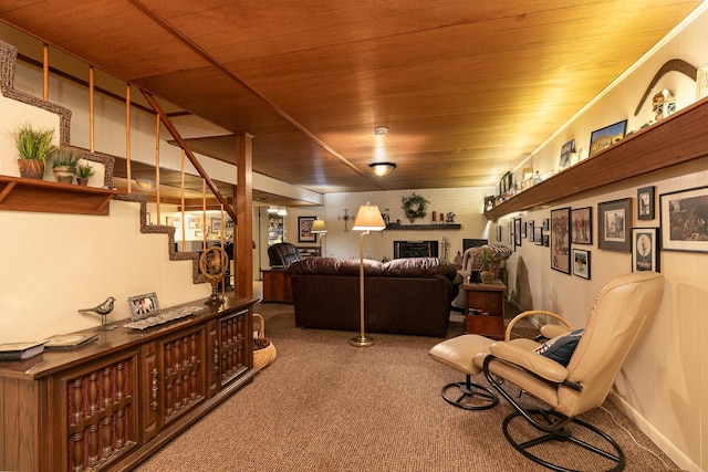 610 W Summit St, Bolivar, MO 65613 - carpeted living area with wood ceiling, a fireplace, and stairs