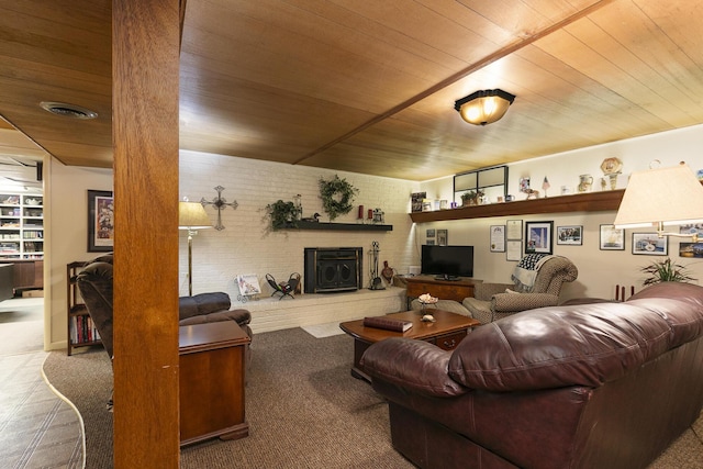 610 W Summit St, Bolivar, MO 65613 - living area with wood ceiling, carpet floors, a brick fireplace, and brick wall