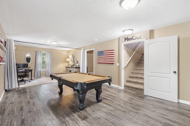 241 Everett Ml Rd, Branson, MO 65616 - playroom with a textured ceiling, wood finished floors, billiards table, and a desk