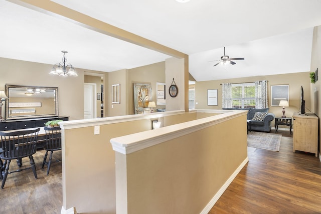 241 Everett Ml Rd, Branson, MO 65616 - kitchen featuring dark wood finished floors, a chandelier, a ceiling fan, open floor plan, and lofted ceiling