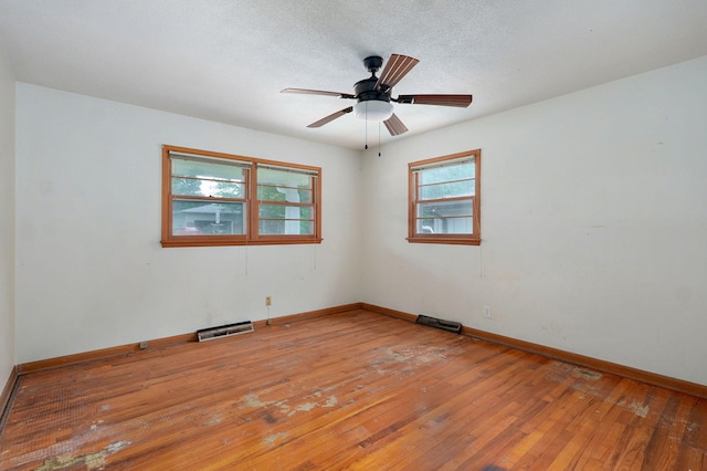 1415 S Sieger Dr, Springfield, MO 65804 - spare room featuring light wood finished floors and ceiling fan