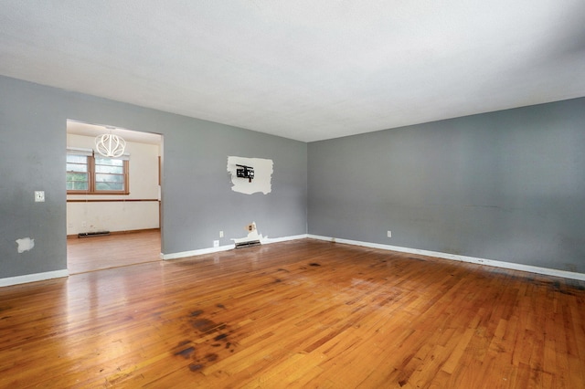 1415 S Sieger Dr, Springfield, MO 65804 - unfurnished room with wood-type flooring