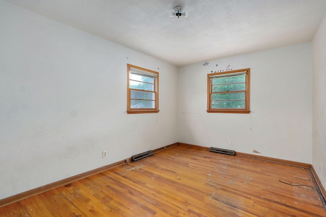1415 S Sieger Dr, Springfield, MO 65804 - spare room featuring light wood-style floors
