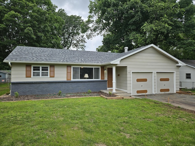 1955 S Fort Ave, Springfield, MO 65807 - single story home featuring a garage, driveway, a front lawn, and brick siding