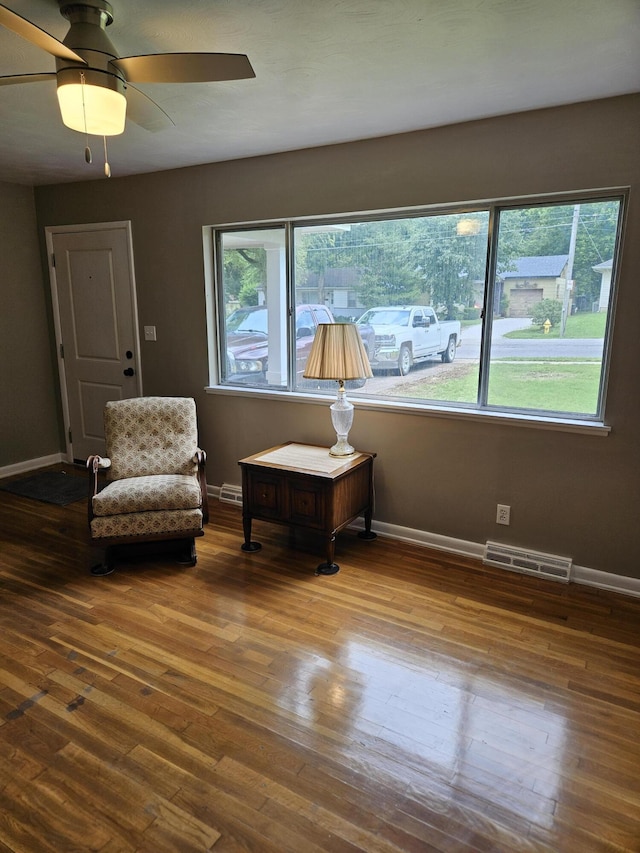 1955 S Fort Ave, Springfield, MO 65807 - living area featuring hardwood / wood-style floors and ceiling fan