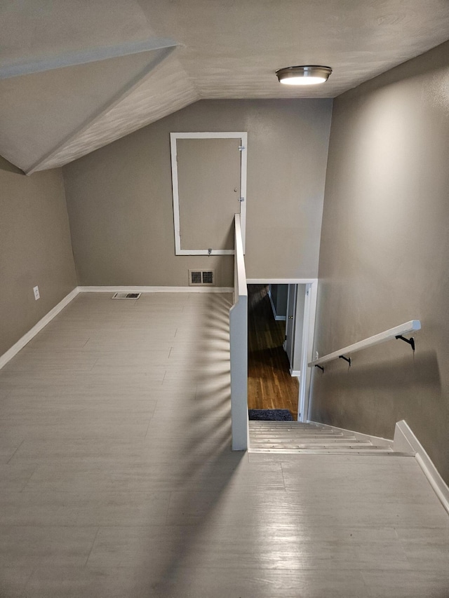 1955 S Fort Ave, Springfield, MO 65807 - bonus room featuring lofted ceiling and wood finished floors