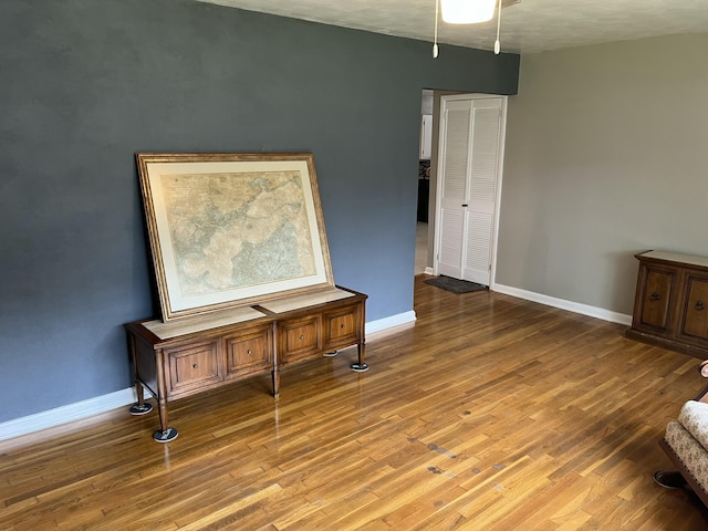 1955 S Fort Ave, Springfield, MO 65807 - empty room featuring wood finished floors and ceiling fan
