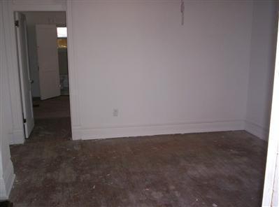 447 S New, Springfield, MO 65806 - unfurnished room with baseboards