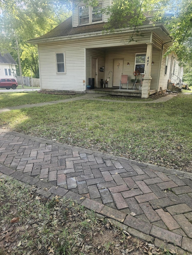 447 S New, Springfield, MO 65806 - back of property with covered porch and a yard