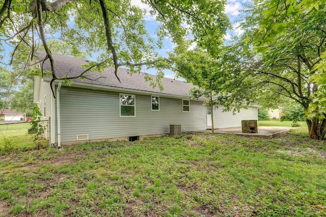 4852 S Fremont Ave, Springfield, MO 65804 - back of property with a patio and a shingled roof