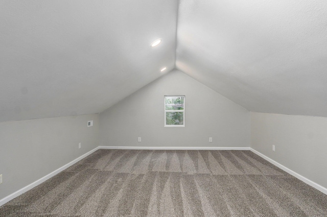 4852 S Fremont Ave, Springfield, MO 65804 - additional living space with vaulted ceiling and carpet flooring