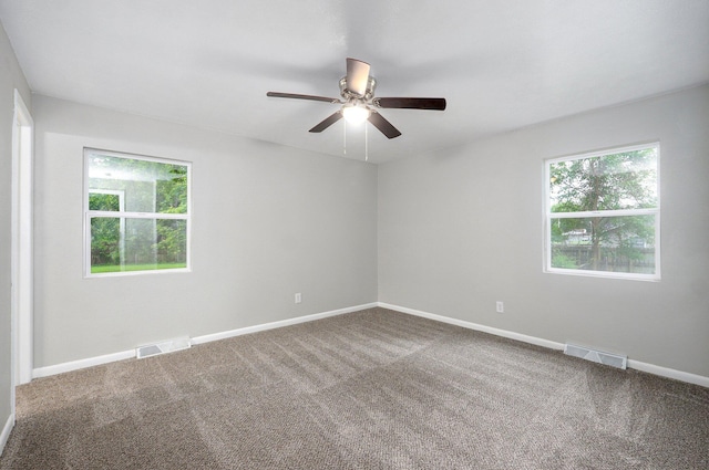 4852 S Fremont Ave, Springfield, MO 65804 - carpeted empty room featuring healthy amount of natural light and ceiling fan