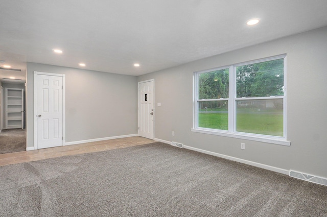 4852 S Fremont Ave, Springfield, MO 65804 - carpeted empty room with recessed lighting and baseboards