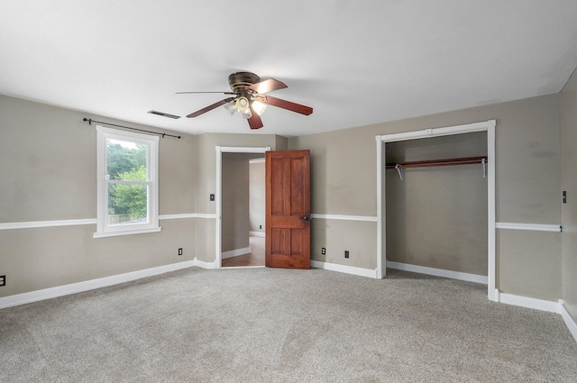902 S Hickory St, Mount Vernon, MO 65712 - unfurnished bedroom with a closet, carpet floors, and a ceiling fan