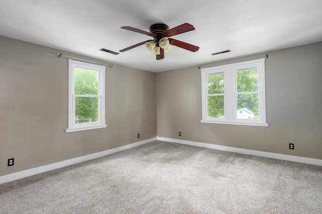 902 S Hickory St, Mount Vernon, MO 65712 - empty room with carpet floors and a ceiling fan
