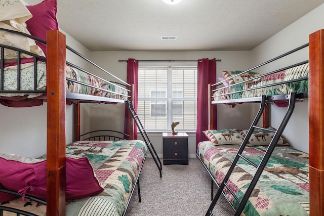 2529 State Highway 176 Unit F2, Rockaway Beach, MO 65740 - carpeted bedroom featuring a textured ceiling