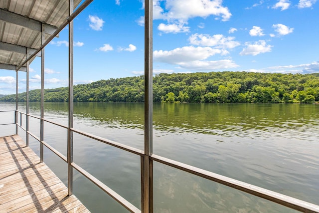 2529 State Highway 176 Unit F2, Rockaway Beach, MO 65740 - dock with a water view, a view of trees, and a balcony