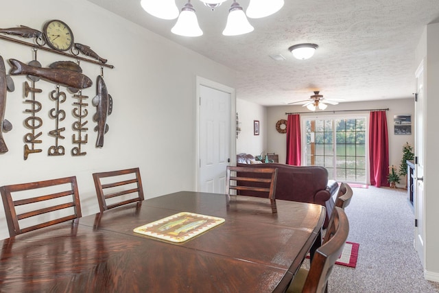 2529 State Highway 176 Unit F2, Rockaway Beach, MO 65740 - carpeted dining space with ceiling fan, a chandelier, and a textured ceiling