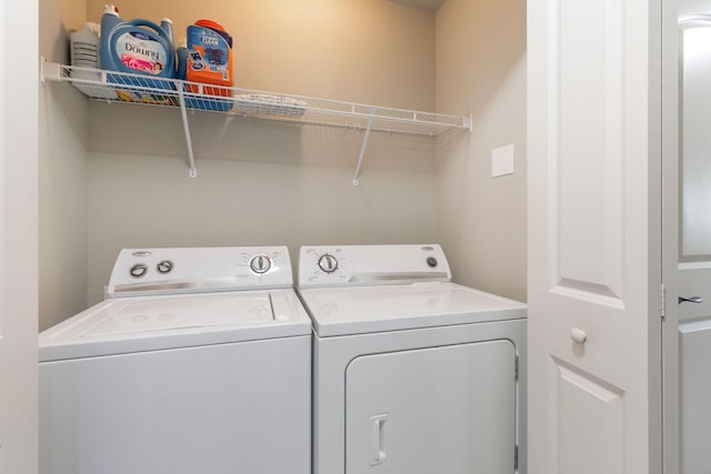2529 State Highway 176 Unit F2, Rockaway Beach, MO 65740 - laundry room featuring separate washer and dryer
