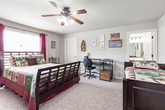 2529 State Highway 176 Unit F2, Rockaway Beach, MO 65740 - bedroom with carpet floors, a desk, ceiling fan, a textured ceiling, and connected bathroom
