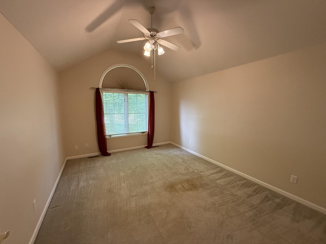 5218 S Gary Ct, Springfield, MO 65810 - spare room with a ceiling fan, light colored carpet, and lofted ceiling