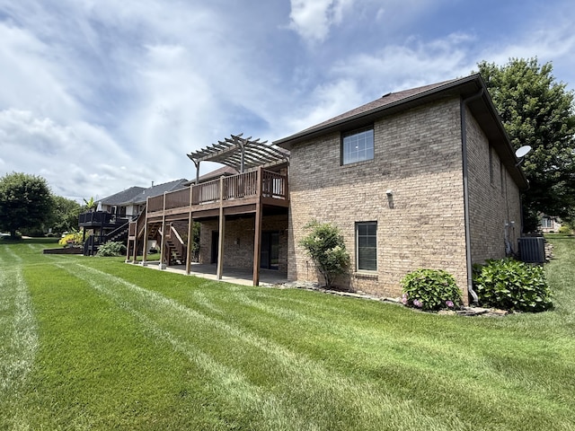 5218 S Gary Ct, Springfield, MO 65810 - back of property with a pergola, stairs, brick siding, a deck, and a patio