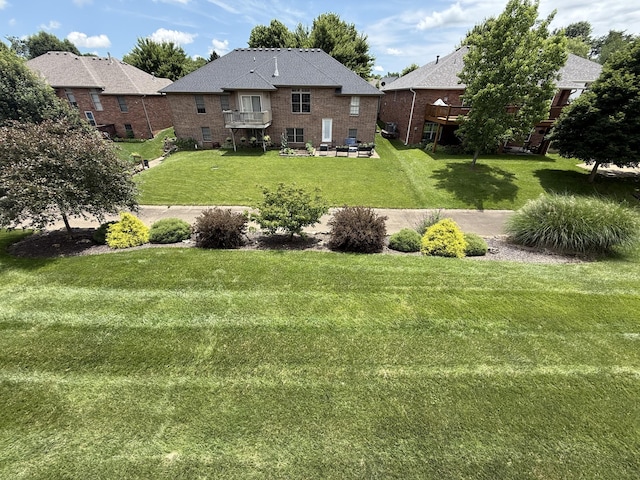 5218 S Gary Ct, Springfield, MO 65810 - view of grassy yard featuring a balcony