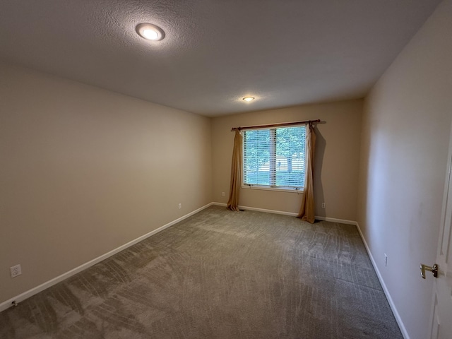 5218 S Gary Ct, Springfield, MO 65810 - unfurnished room featuring carpet and a textured ceiling