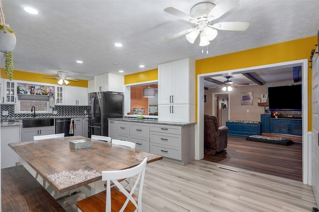 3449 N Rogers Ave, Springfield, MO 65803 - dining space featuring a ceiling fan, light wood finished floors, recessed lighting, and a textured ceiling