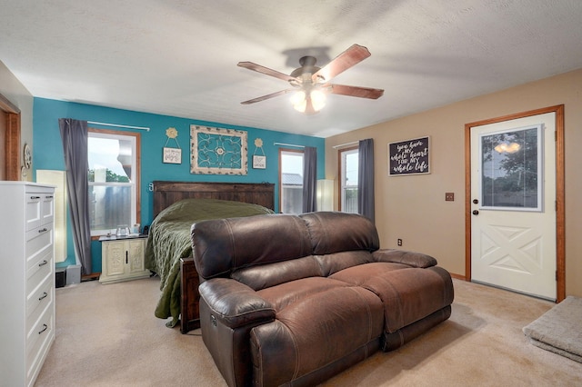 3449 N Rogers Ave, Springfield, MO 65803 - bedroom featuring light carpet and a ceiling fan