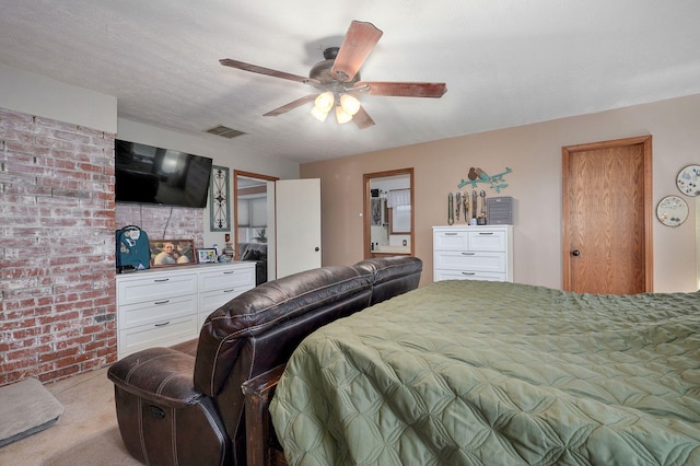 3449 N Rogers Ave, Springfield, MO 65803 - bedroom with brick wall, light carpet, and ceiling fan