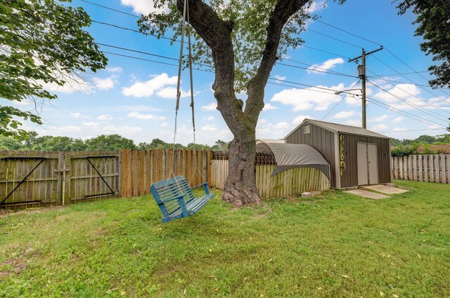3449 N Rogers Ave, Springfield, MO 65803 - fenced backyard featuring a shed