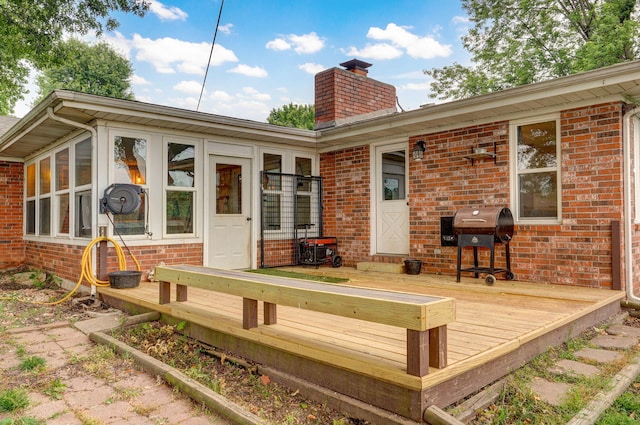 3449 N Rogers Ave, Springfield, MO 65803 - wooden terrace with a grill