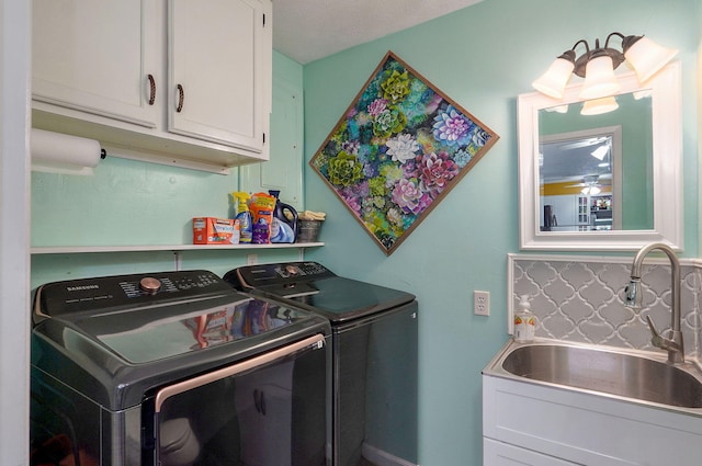 3449 N Rogers Ave, Springfield, MO 65803 - laundry room featuring separate washer and dryer and cabinet space