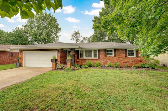 3449 N Rogers Ave, Springfield, MO 65803 - single story home featuring a garage, brick siding, driveway, and a front yard