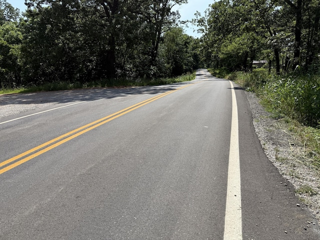 5641 State Highway K, Pineville, MO 64856 - view of asphalt street with a wooded view