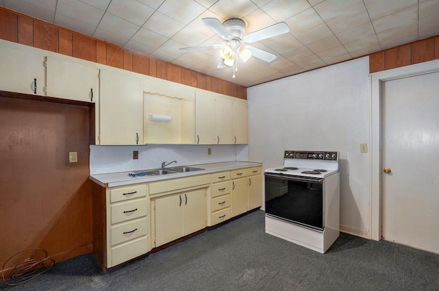 408 S 8th Ave, Ozark, MO 65721 - kitchen with electric stove, ceiling fan, light countertops, and dark carpet