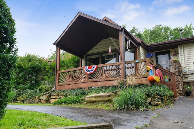 781 Santana Cir, Reeds Spring, MO 65737 - view of property exterior with covered porch
