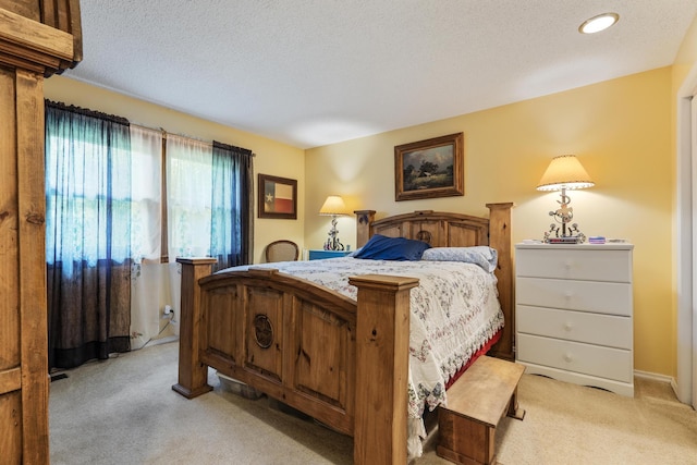 781 Santana Cir, Reeds Spring, MO 65737 - bedroom featuring light colored carpet and a textured ceiling