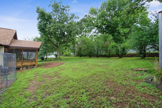 781 Santana Cir, Reeds Spring, MO 65737 - view of green lawn featuring a sunroom