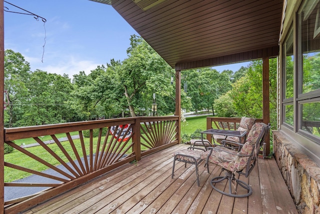 781 Santana Cir, Reeds Spring, MO 65737 - wooden deck featuring a yard and view of wooded area