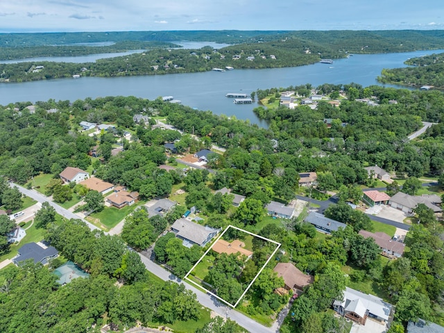 781 Santana Cir, Reeds Spring, MO 65737 - aerial perspective of suburban area featuring property boundaries highlighted and a large body of water