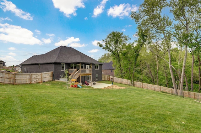 1611 E Hayloft Dr, Ozark, MO 65721 - fenced backyard with stairs, a patio, and a deck